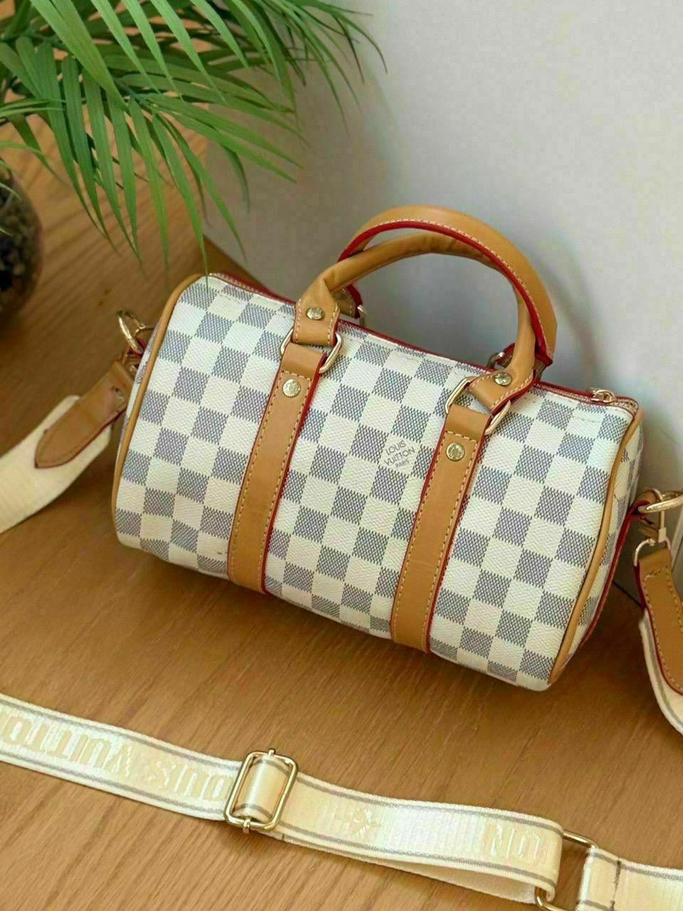 LV Hand & Cross Barrel bag (Patterned)