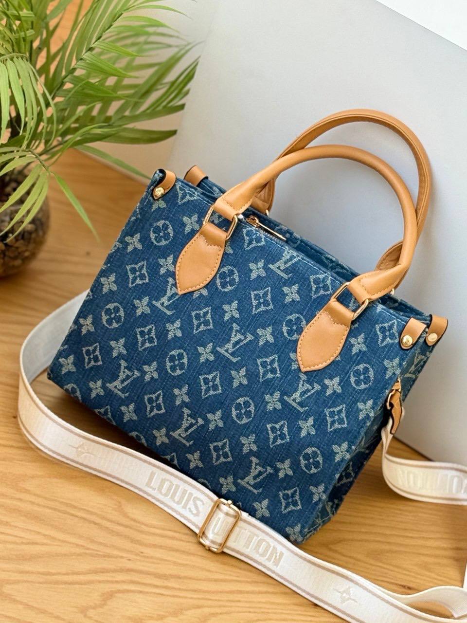Louis Vuitton Embossed Monogram Tote Bag