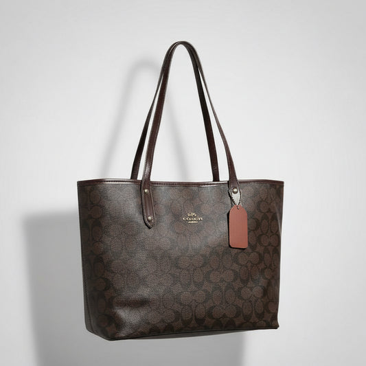 Coach Town Tote with extra pouch.