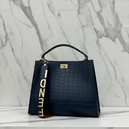 Fendi crocodile effect top handle bag with a gold tone Fendi strap
