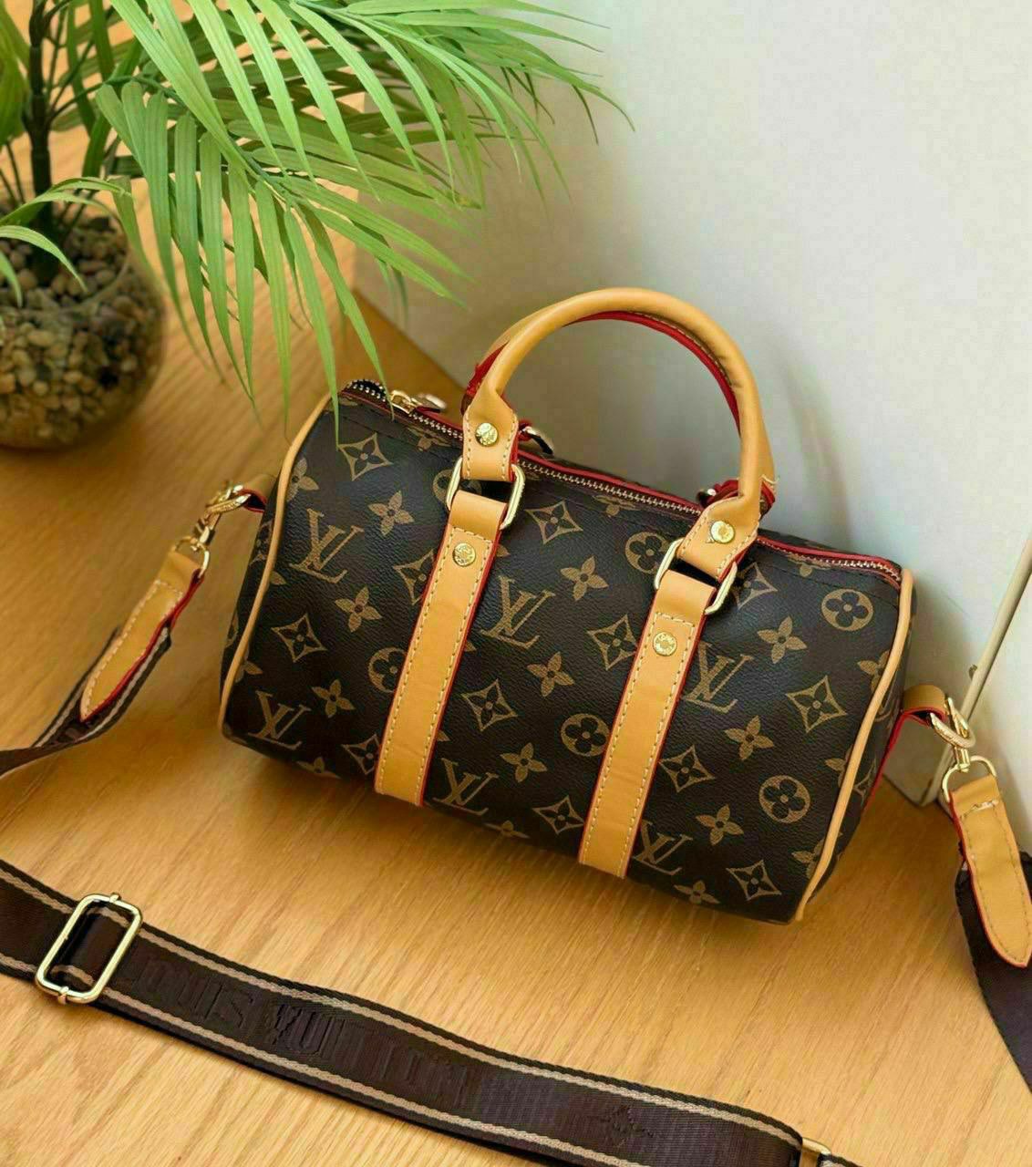 LV Hand & Cross Barrel bag (Patterned)