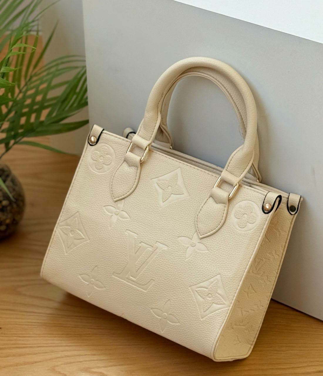 Louis Vuitton Embossed Monogram Tote Bag