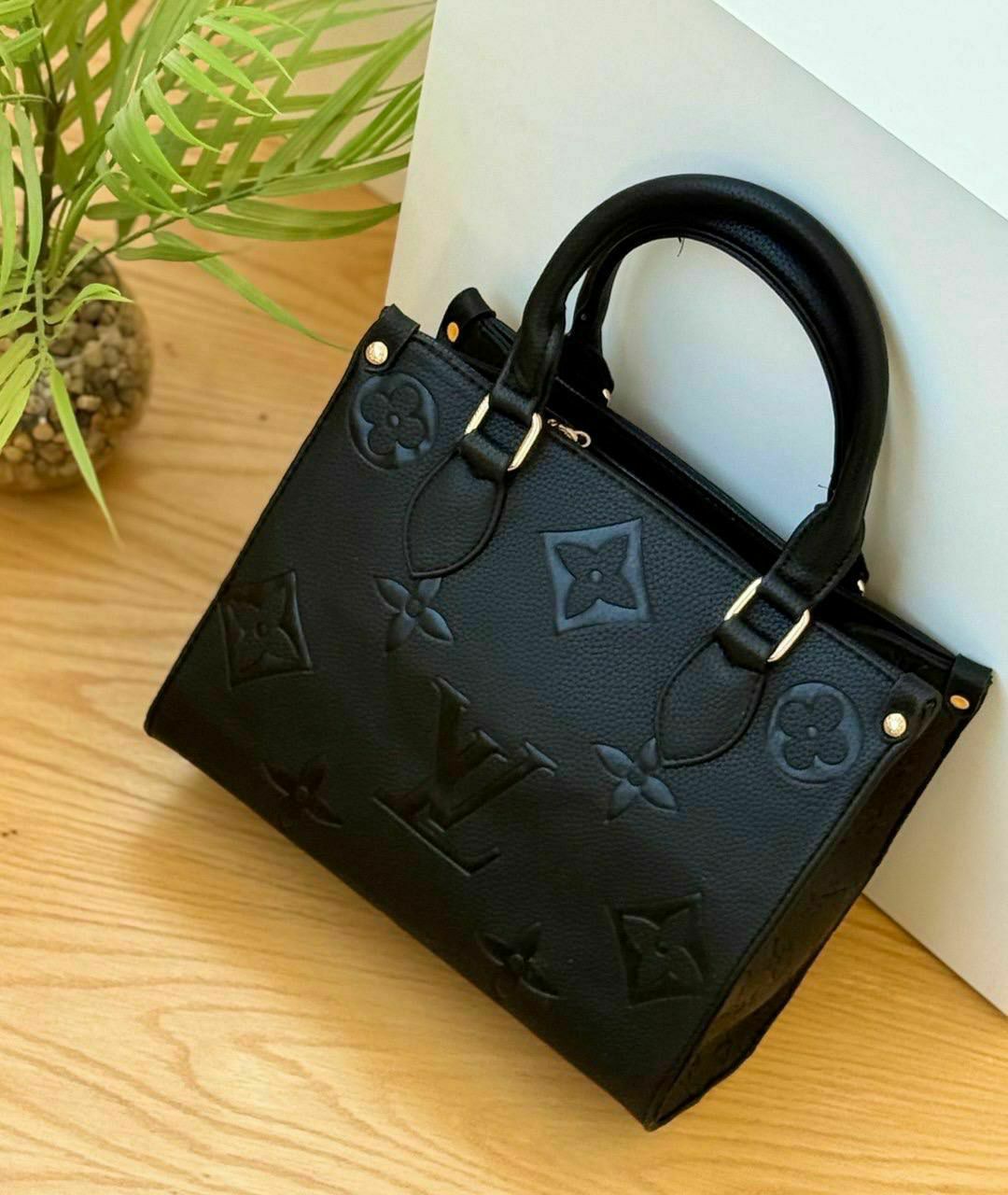 Louis Vuitton Embossed Monogram Tote Bag
