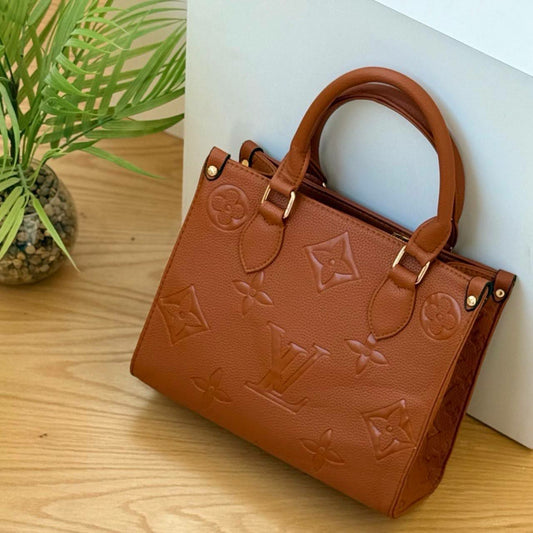 Louis Vuitton Embossed Monogram Tote Bag
