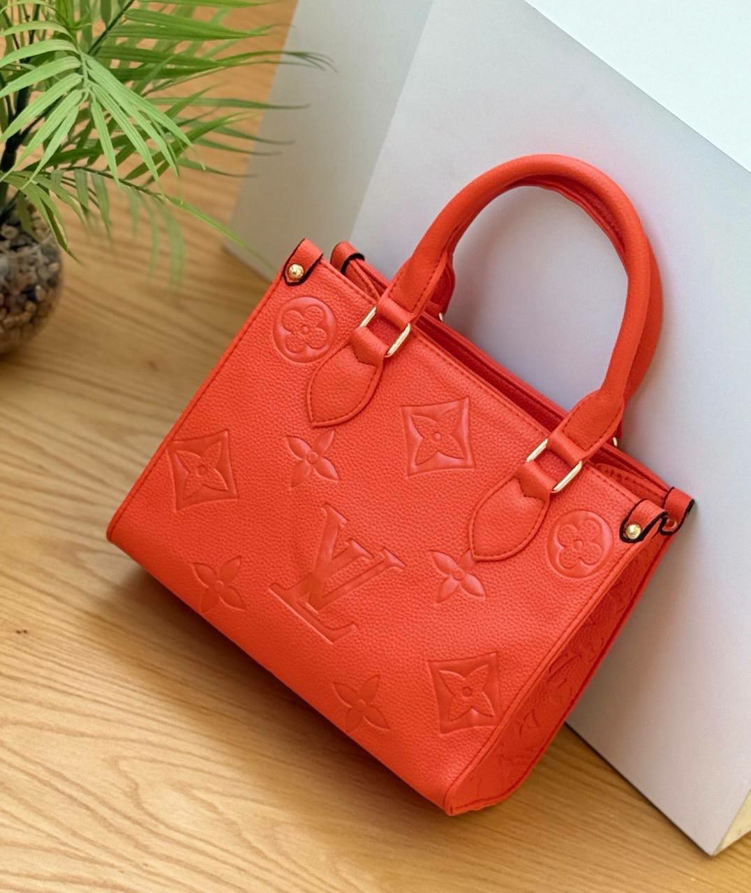 Louis Vuitton Embossed Monogram Tote Bag
