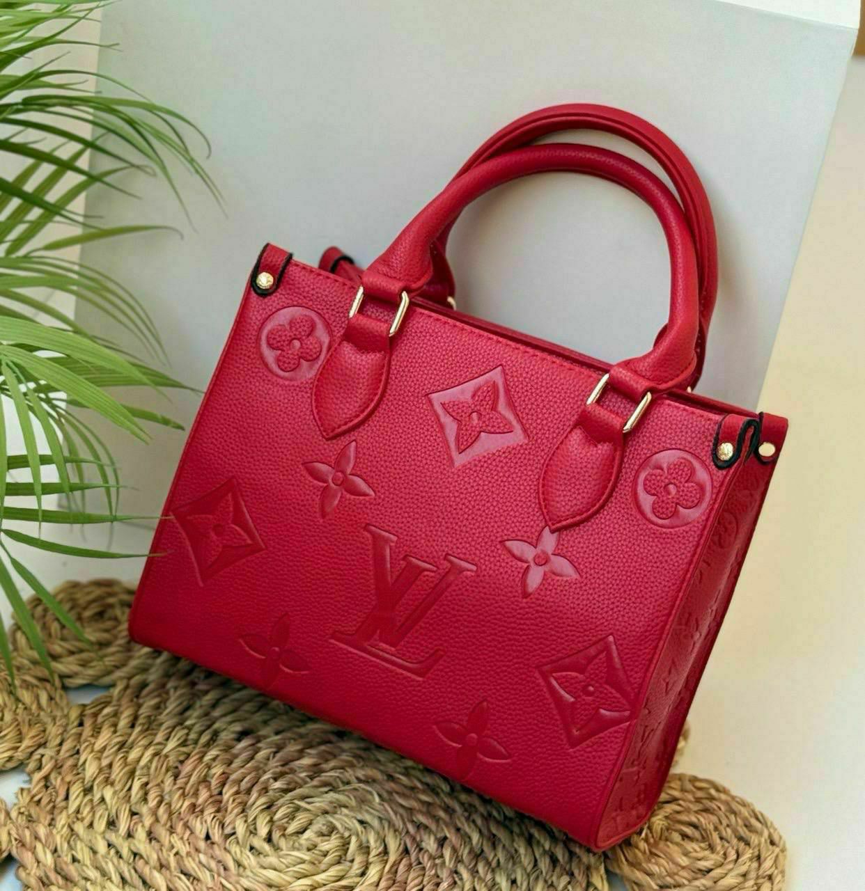 Louis Vuitton Embossed Monogram Tote Bag