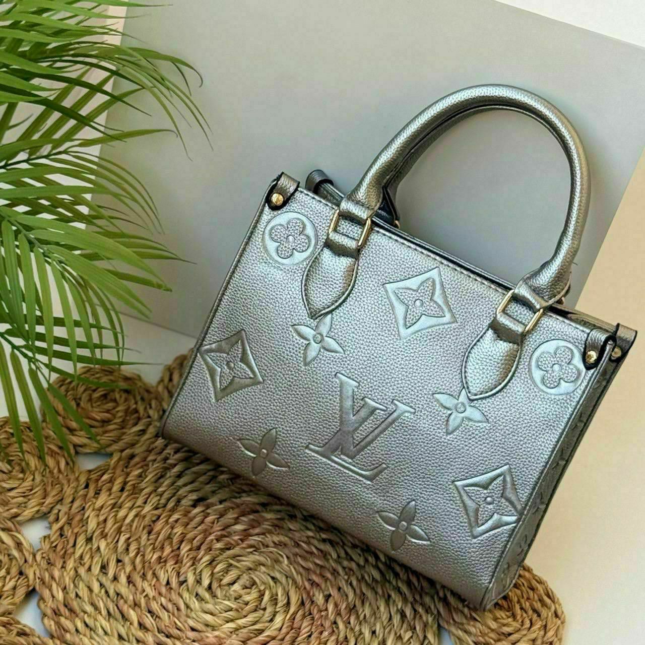 Louis Vuitton Embossed Monogram Tote Bag