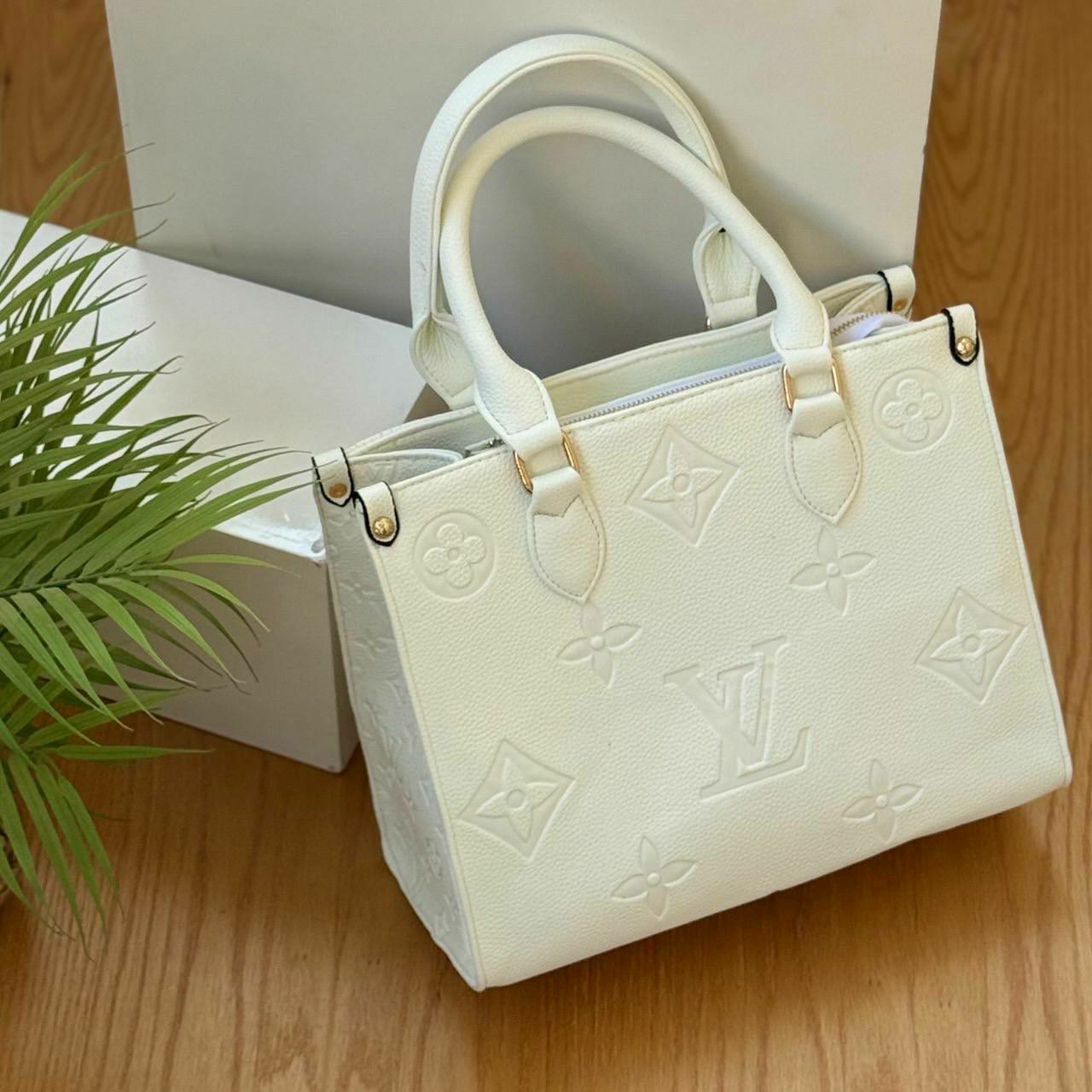 Louis Vuitton Embossed Monogram Tote Bag