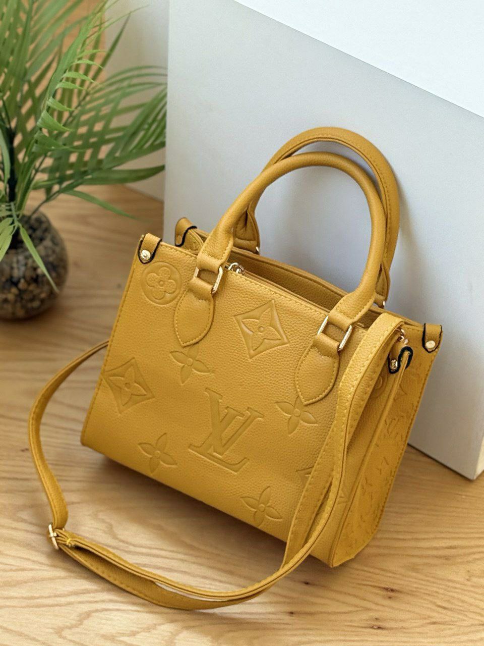 Louis Vuitton Embossed Monogram Tote Bag