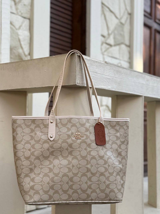 Coach Town Tote with extra pouch.
