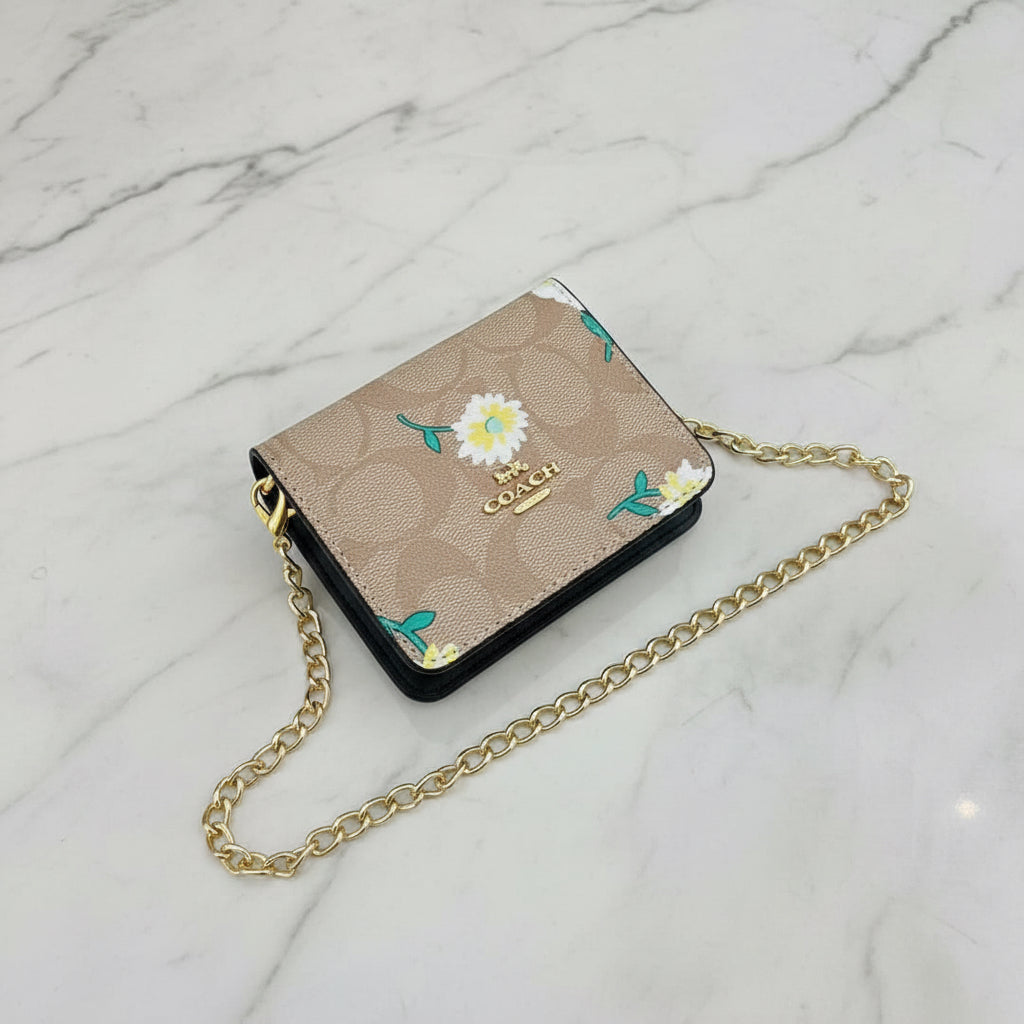 Mini Wallet on a chain with box.
