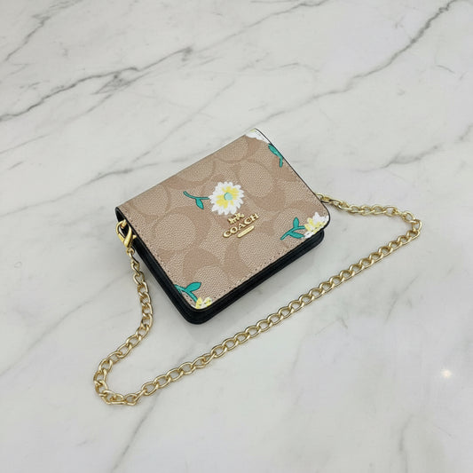 Mini Wallet on a chain with box.