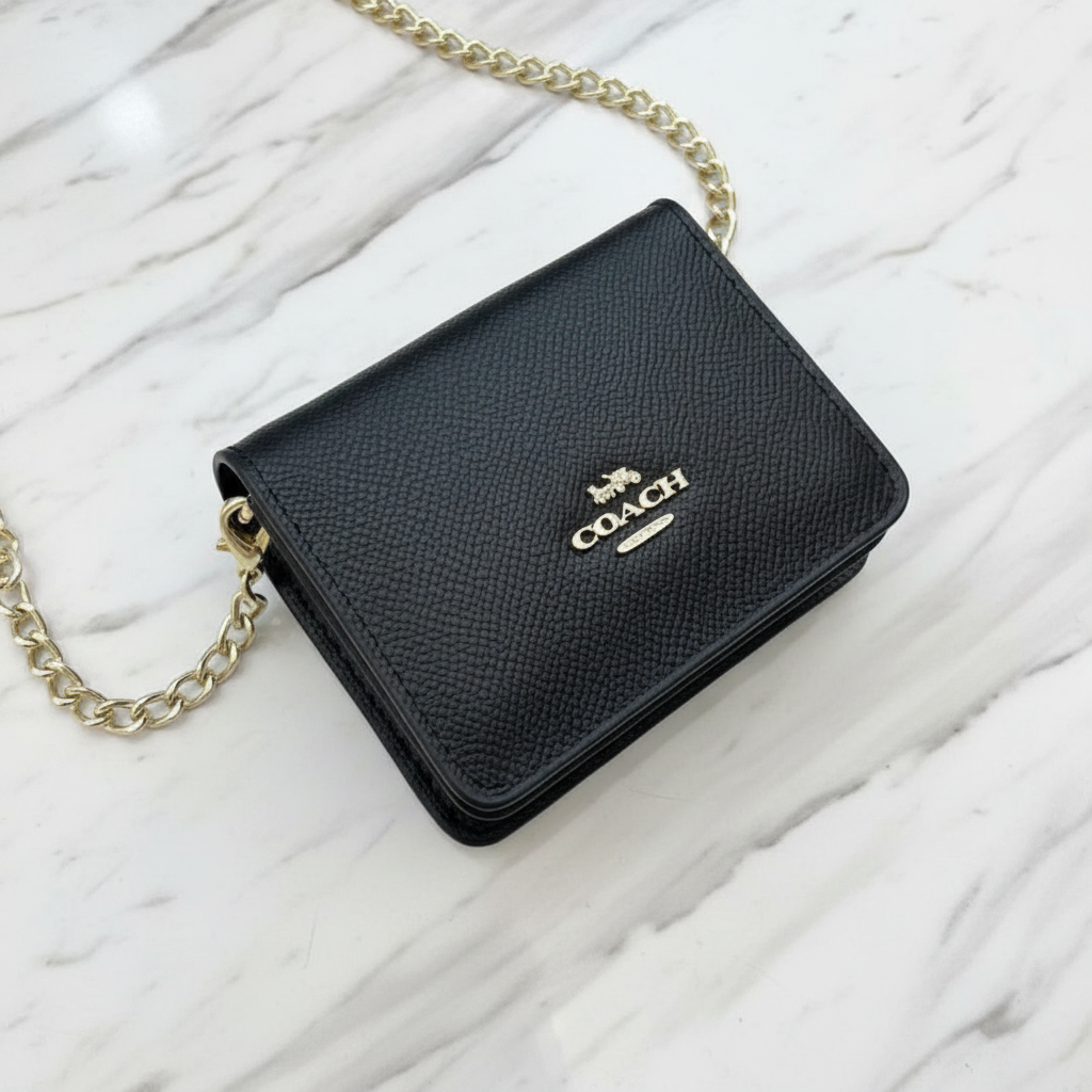 Mini Wallet on a chain with box.