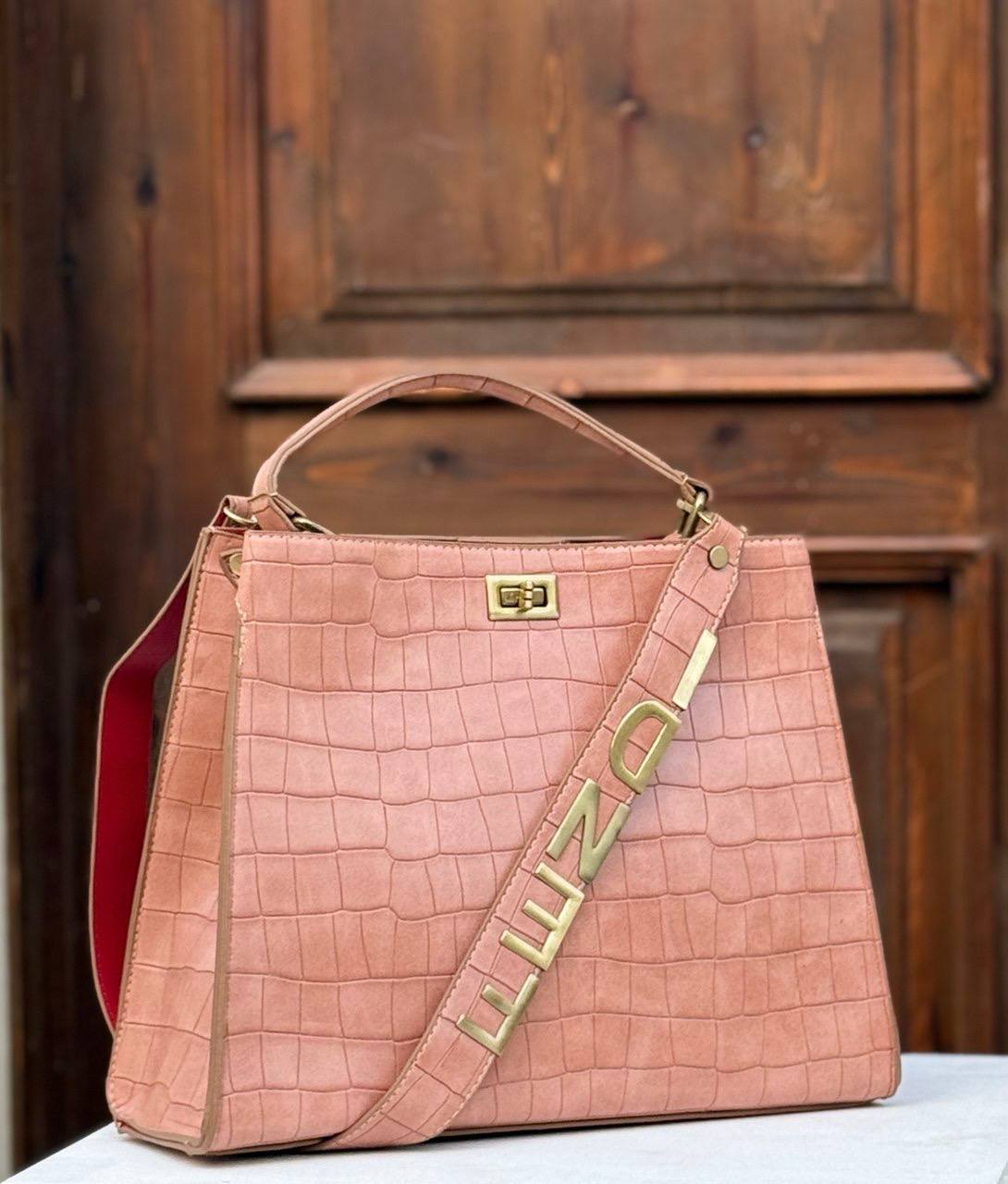 Fendi crocodile effect top handle bag with a gold tone Fendi strap