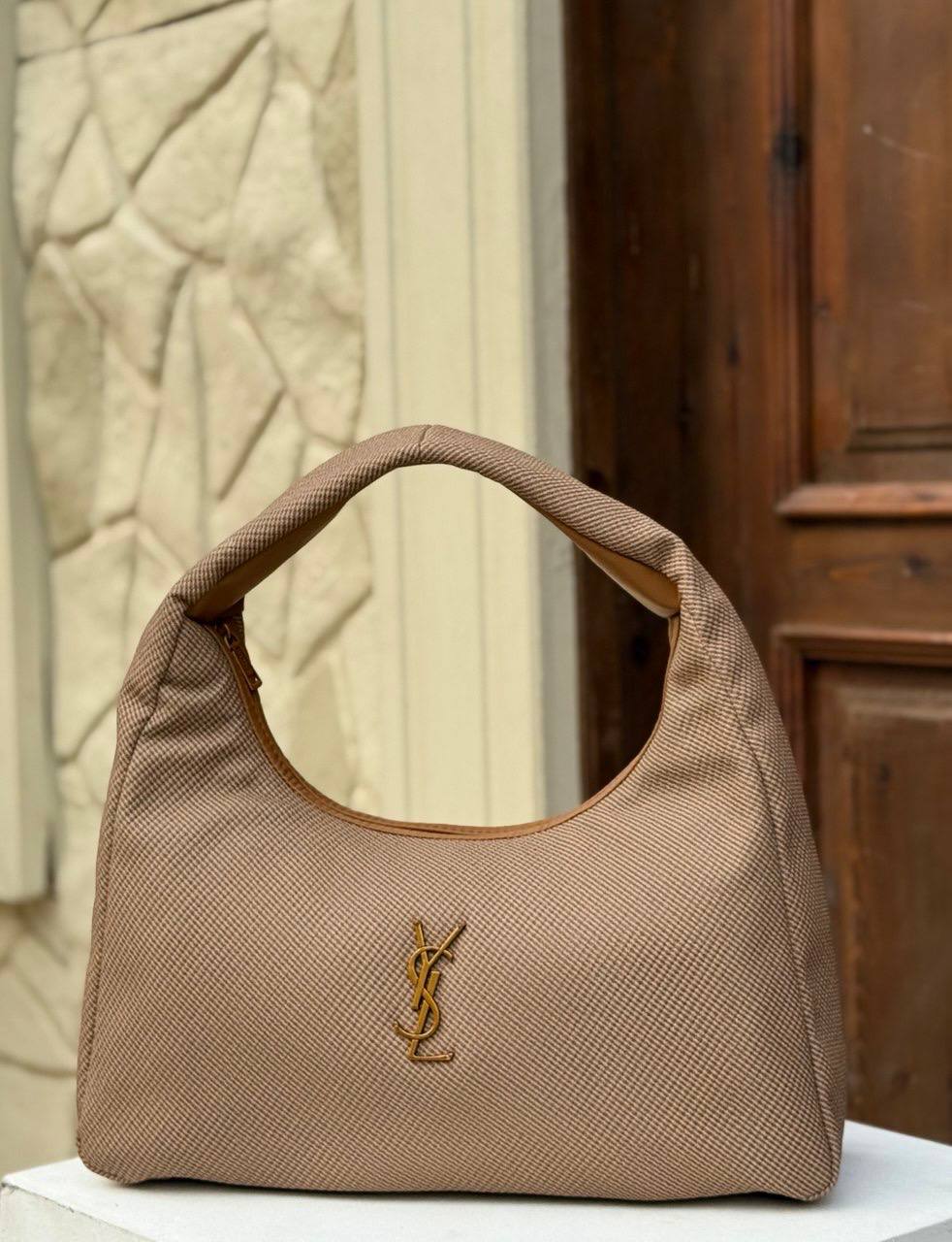 Saint Laurent Calypso - mini hobo bag in a padded lambskin - with gold-tone hardware