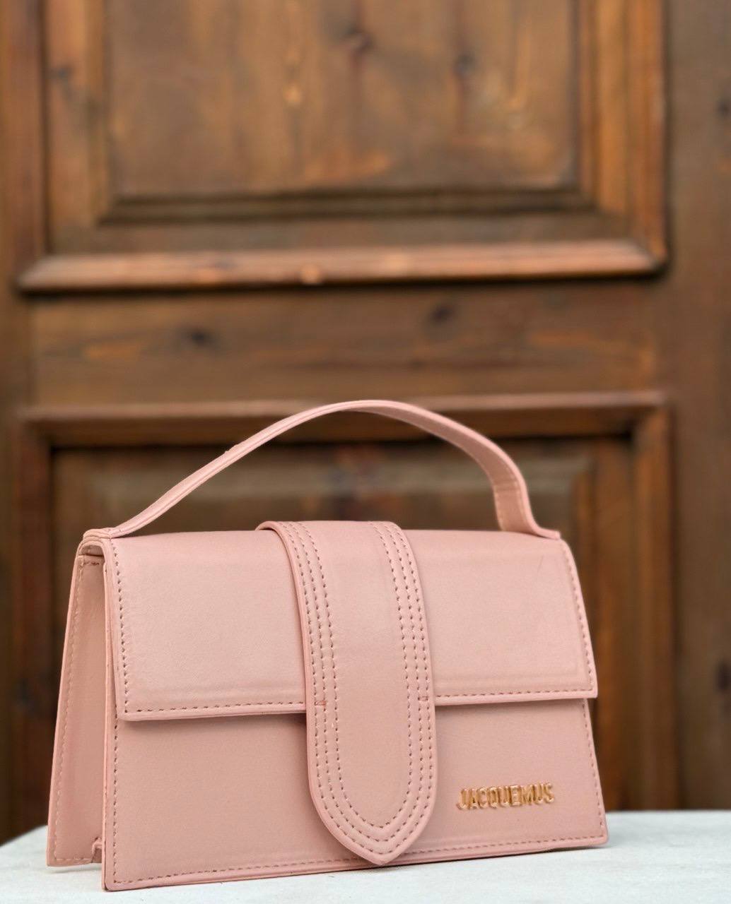 Jacquemus Le Grand Bambino bag - in a smooth leather