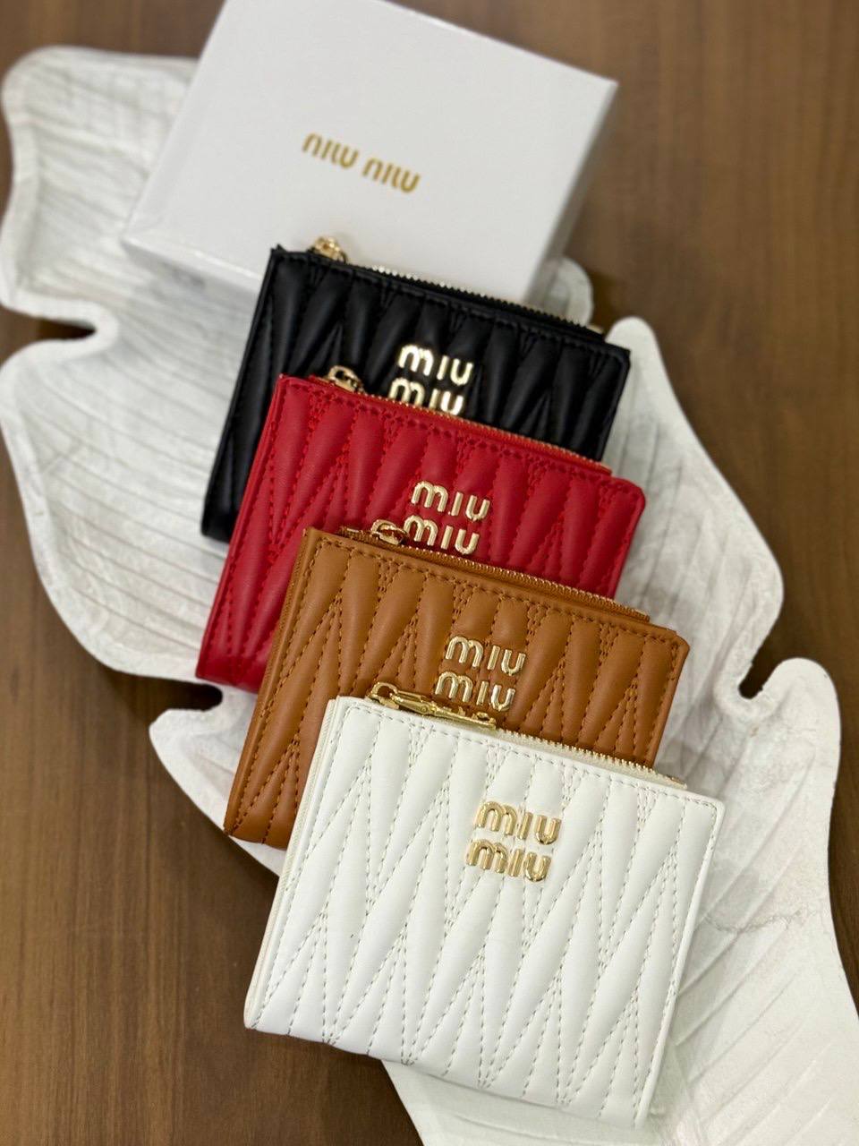 MIU MIU matelassé nappa leather wallets
