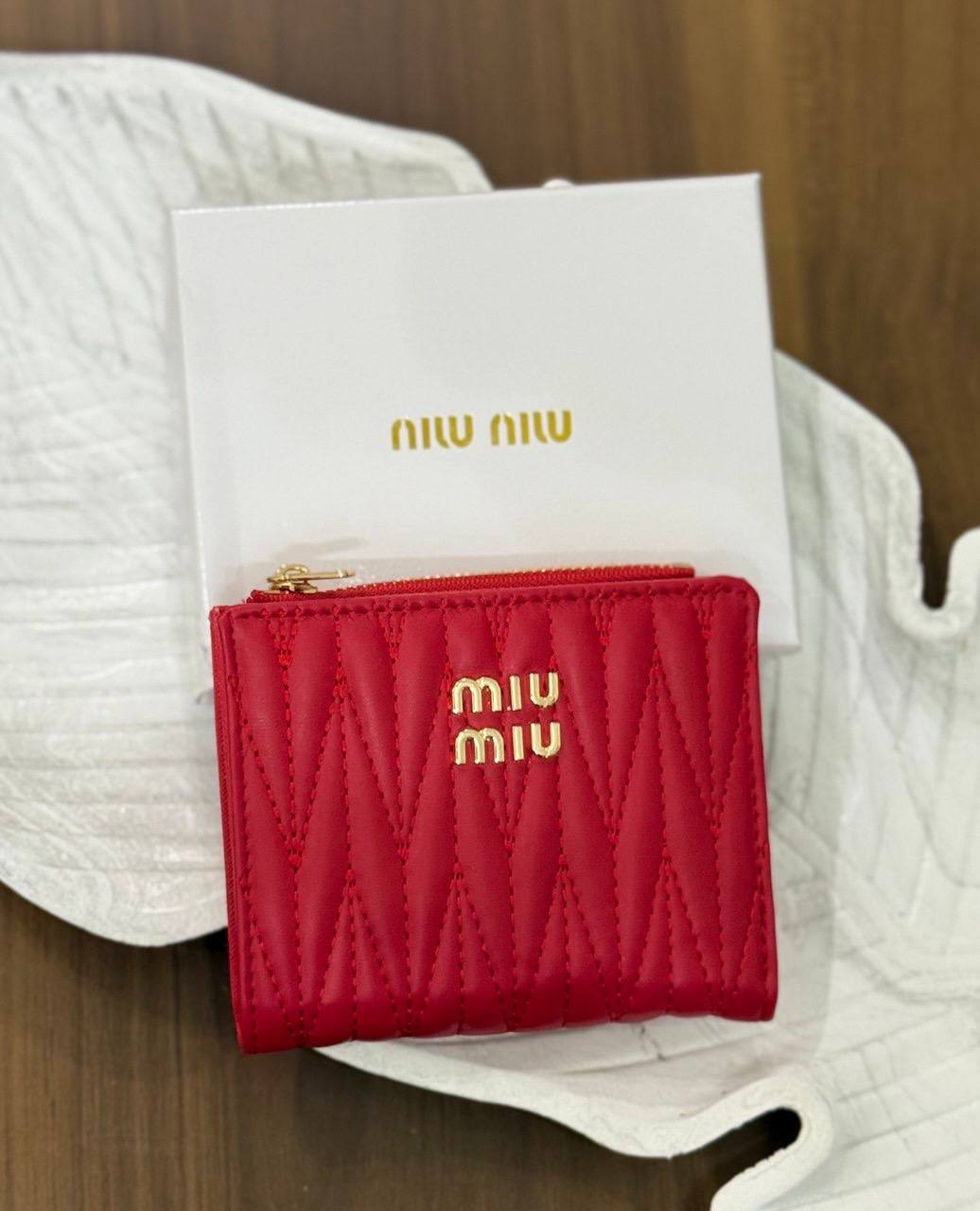MIU MIU matelassé nappa leather wallets