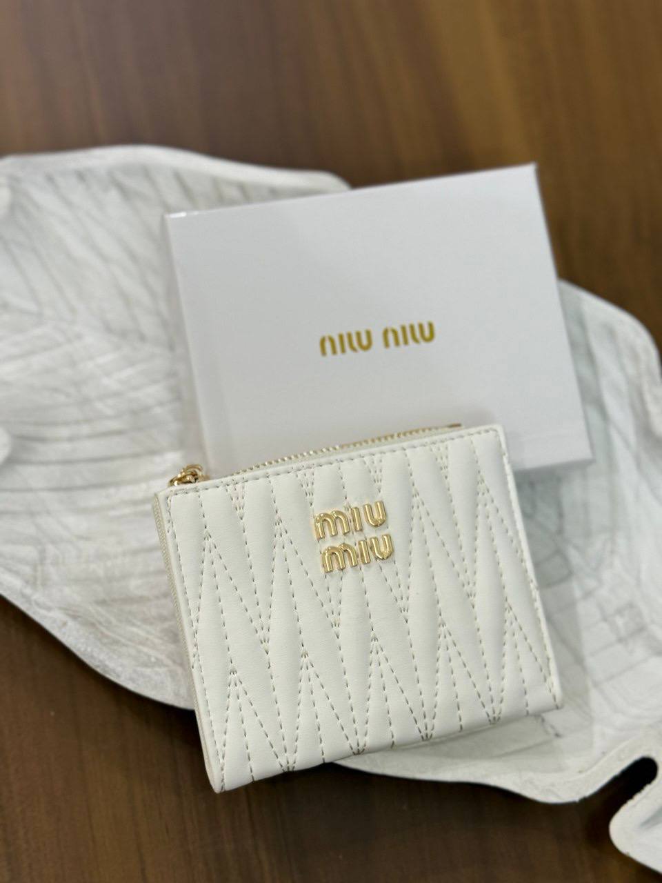 MIU MIU matelassé nappa leather wallets