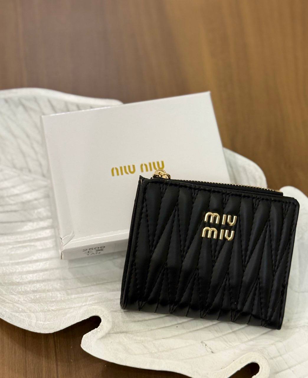 MIU MIU matelassé nappa leather wallets