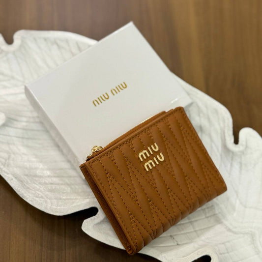 MIU MIU matelassé nappa leather wallets