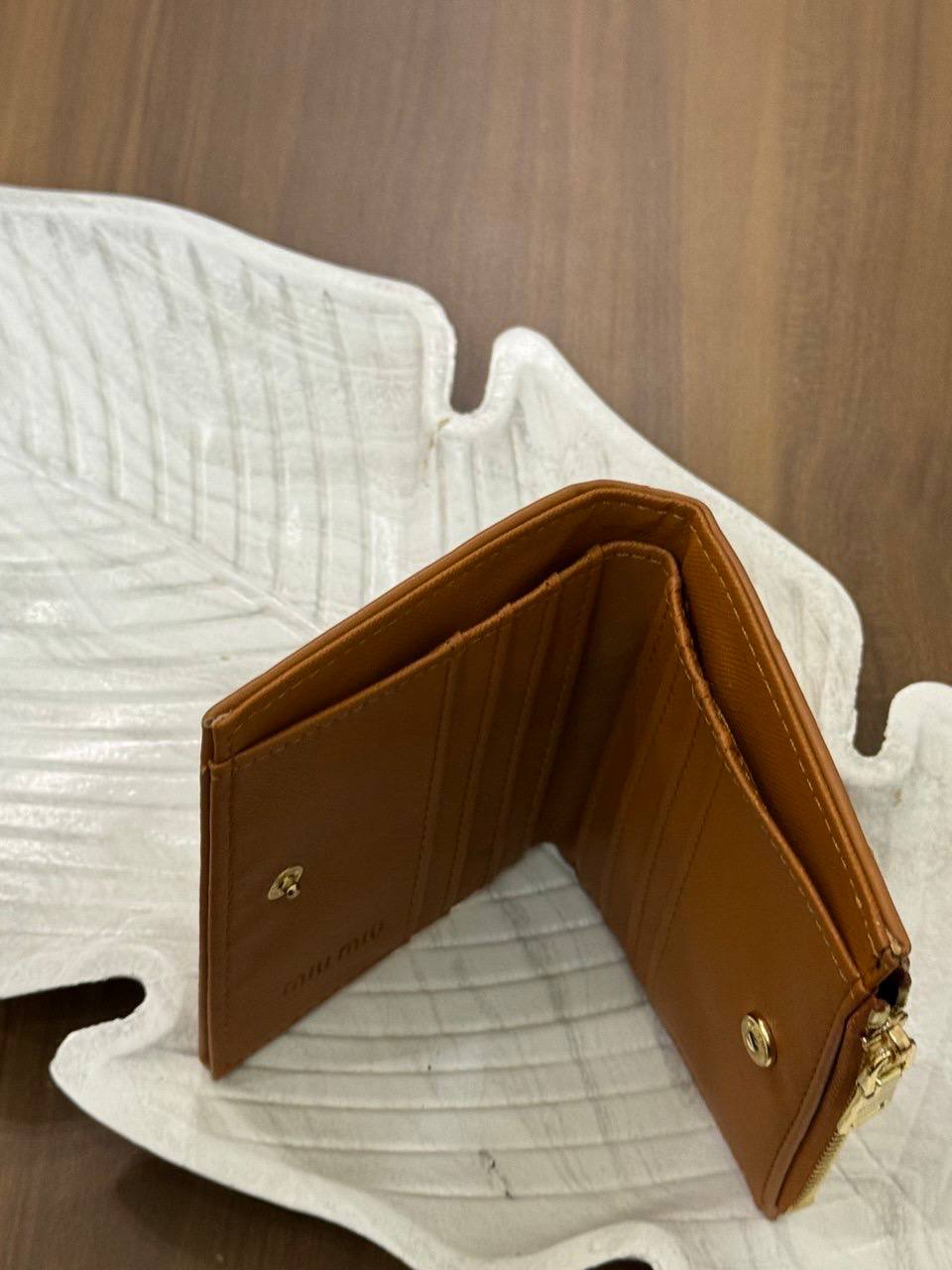MIU MIU matelassé nappa leather wallets